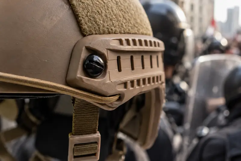 Tan Tactical Helmet — Crowded Public-Order Duty